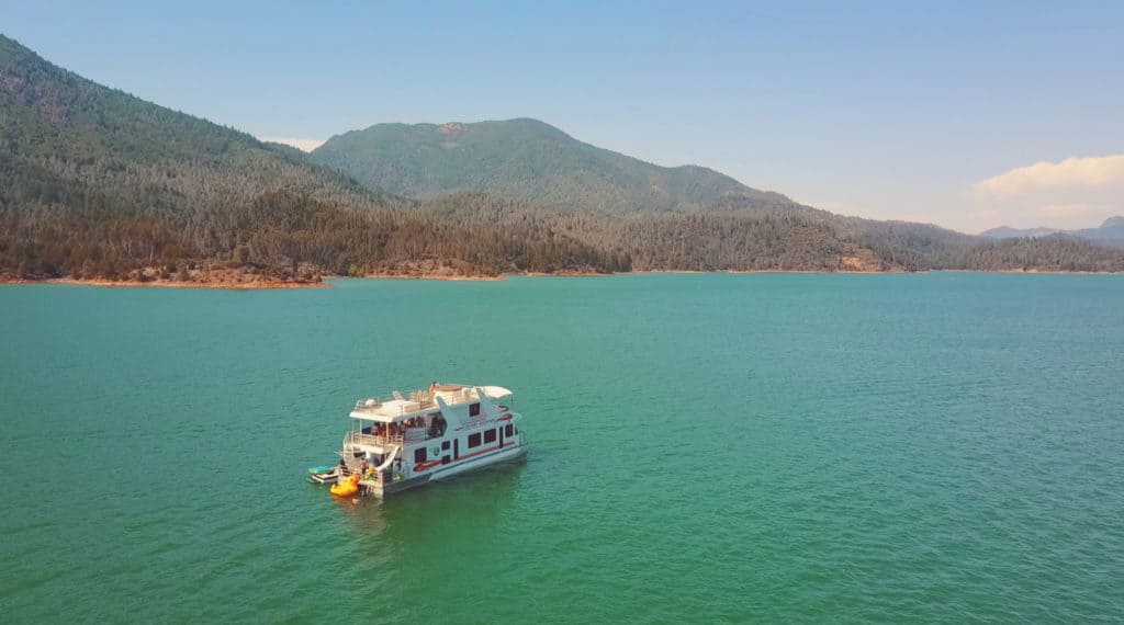 Drone shot of the Silverthorn Queen houseboat on beautiful Shasta Lake