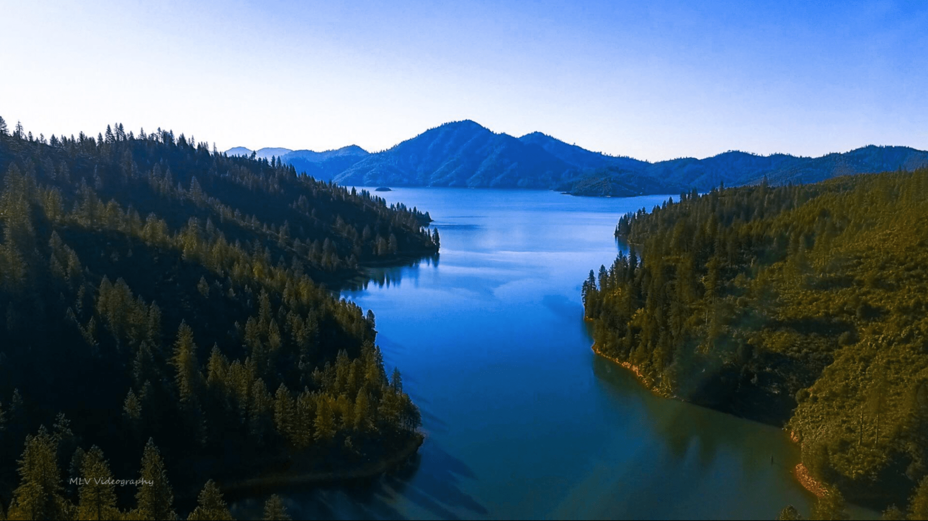 Beautiful drone shot of Shasta Lake and its precious mountain scenery